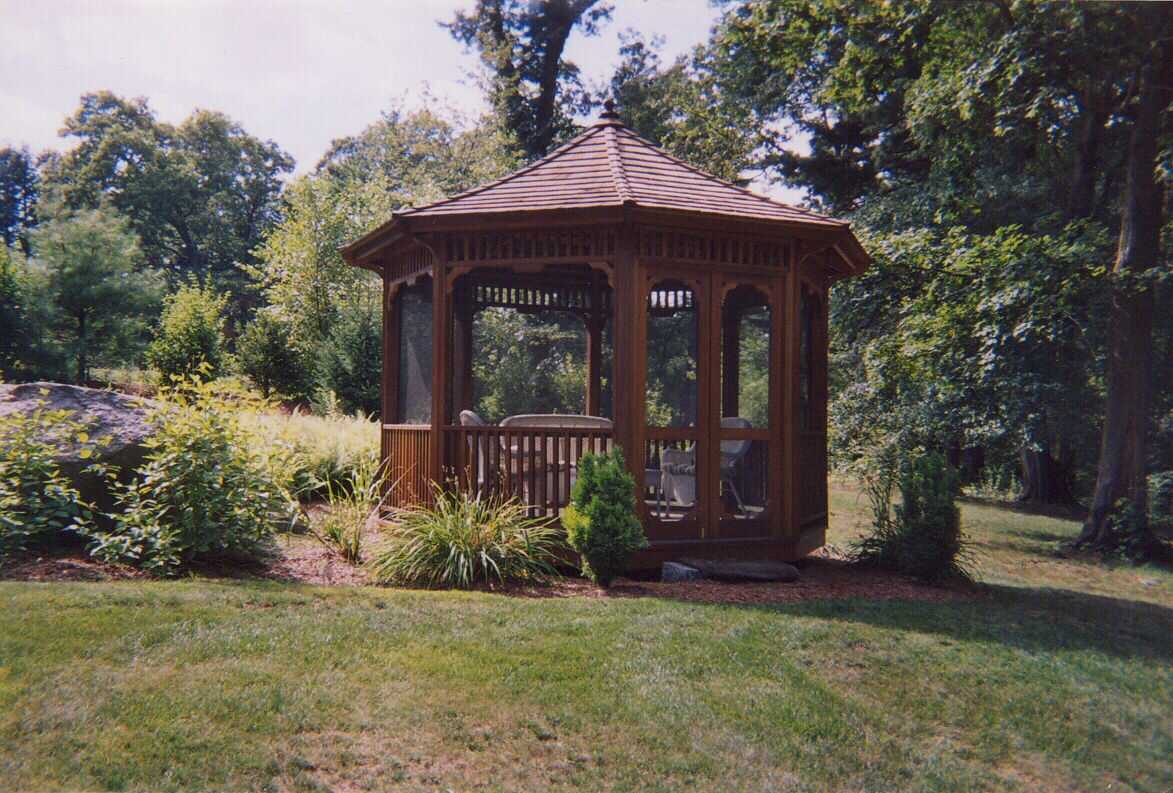 Upper mahogany, gazebo, wood shed, and stockade fence