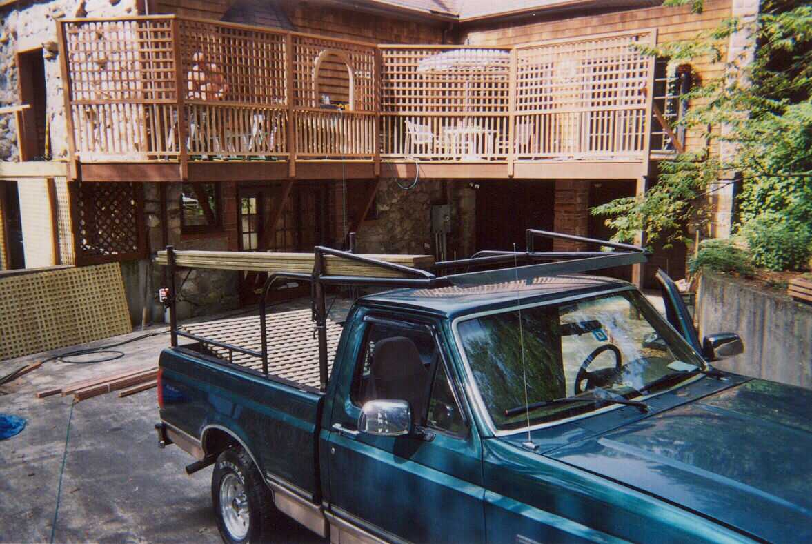 Upper mahogany, gazebo, wood shed, and stockade fence