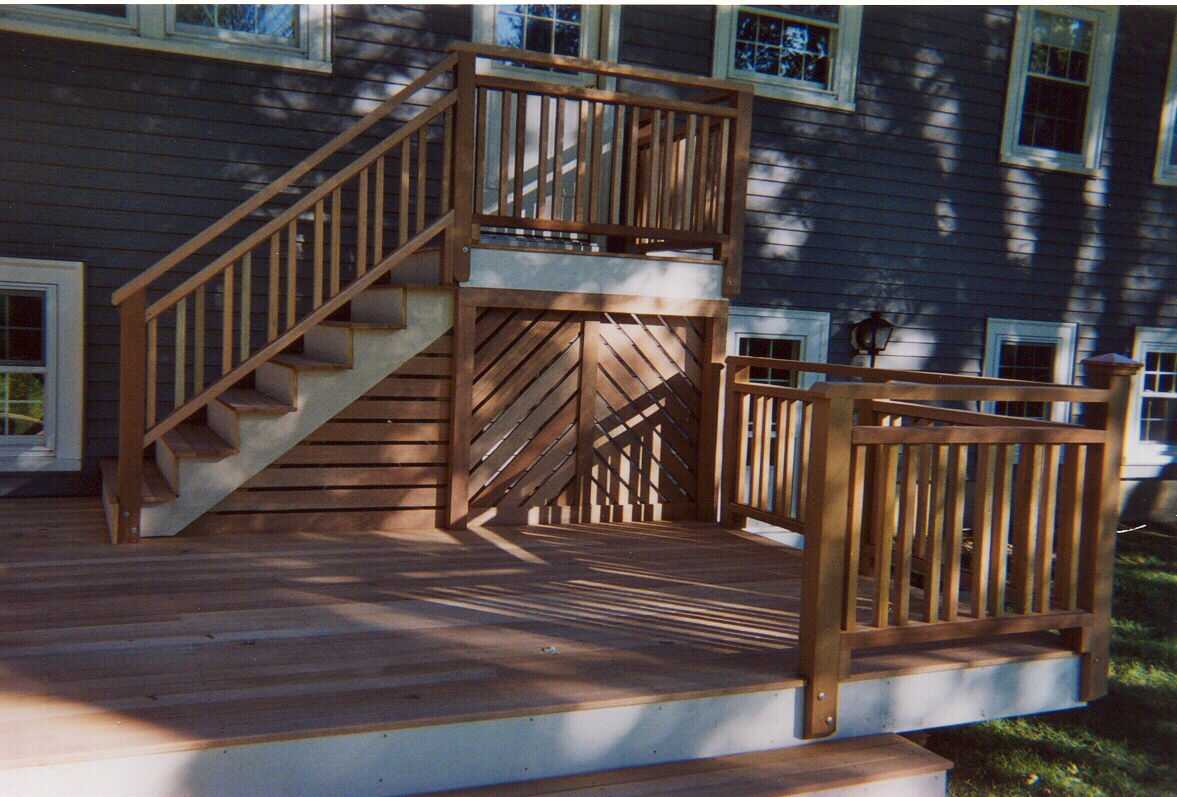 Mahogany deck with rear entry stair and landing.  Gated beneath.