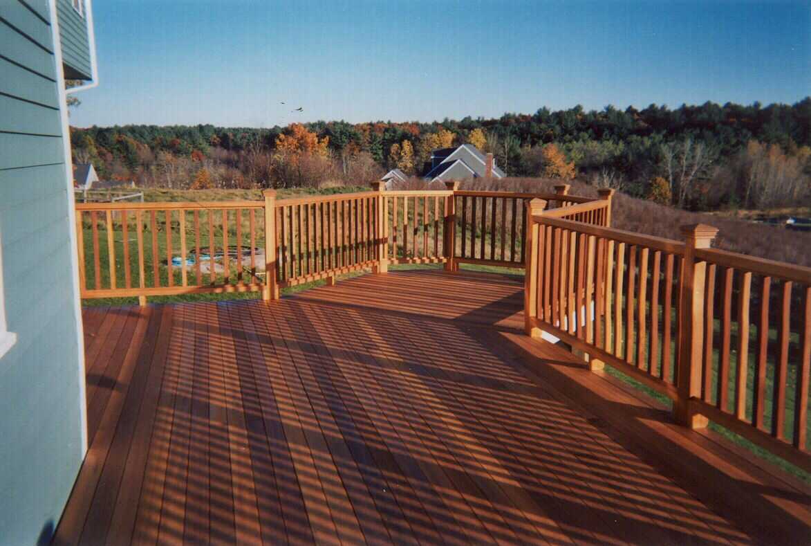 Beautiful mahogany with a bump, stair with turn and square Pressure Treated lattice below.