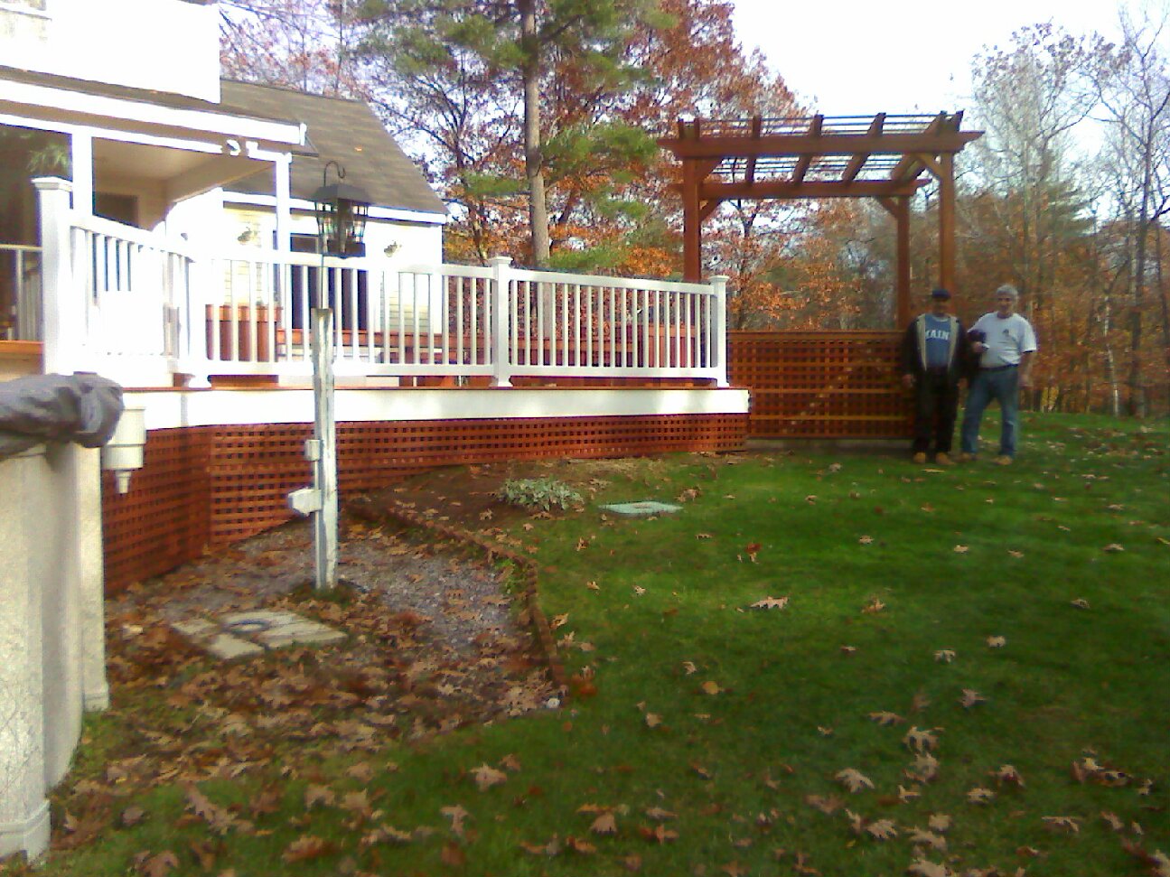 Mahogany Floor with Pergola and Hot Tub:&nbsp; Vinyl Rails & Above Ground Pool;  Custom Benches, Flower Planters, & Gates (Townsend)