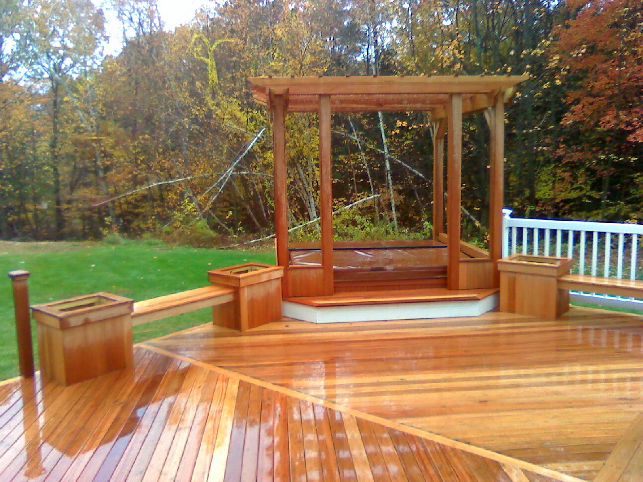 Mahogany Floor with Pergola and Hot Tub:&nbsp; Vinyl Rails & Above Ground Pool;  Custom Benches, Flower Planters, & Gates (Townsend)