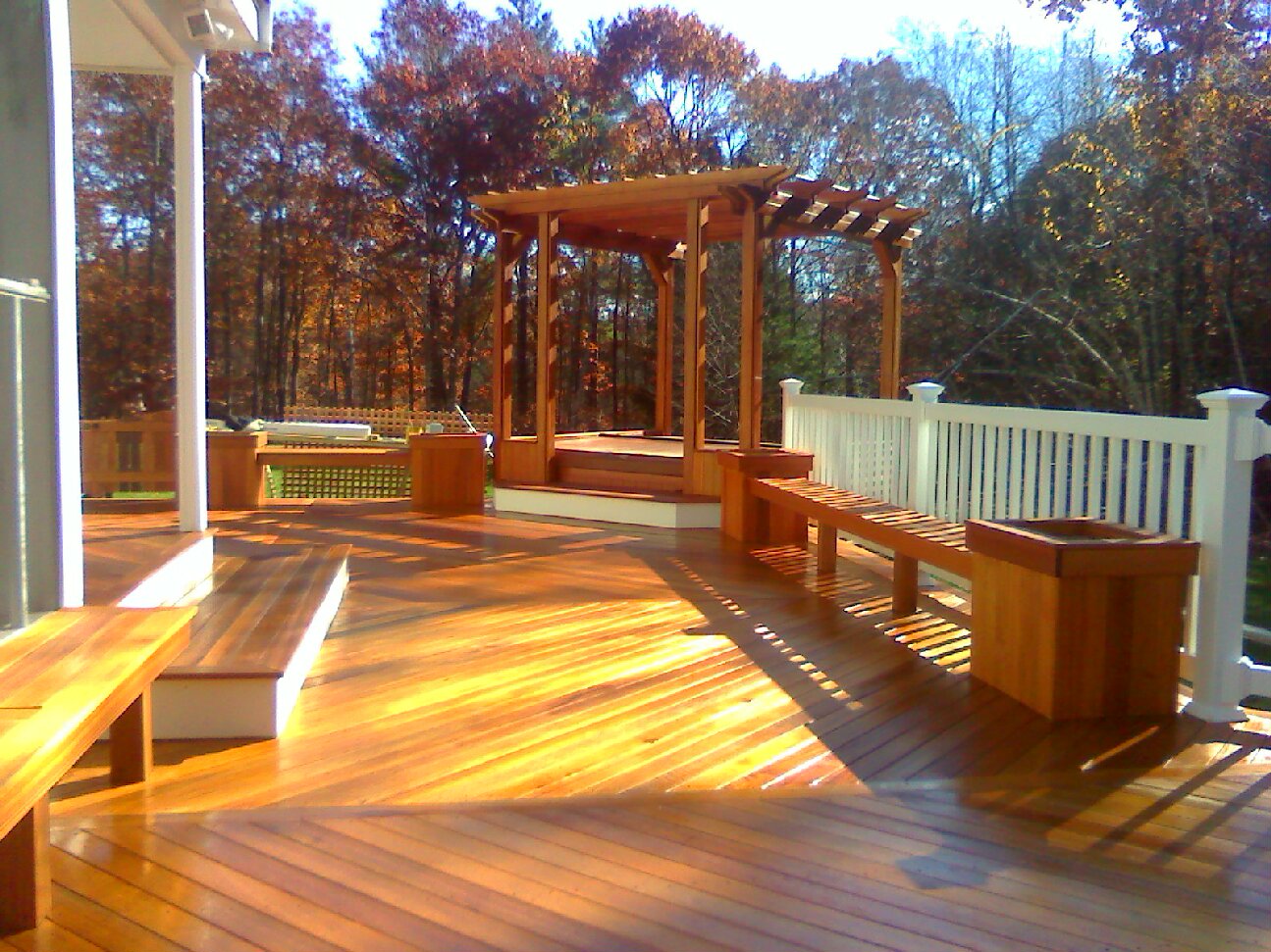 Mahogany Floor with Pergola and Hot Tub:&nbsp; Vinyl Rails & Above Ground Pool;  Custom Benches, Flower Planters, & Gates (Townsend)